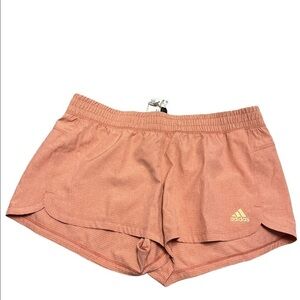 Adidas pacer shorts in light orange color, new